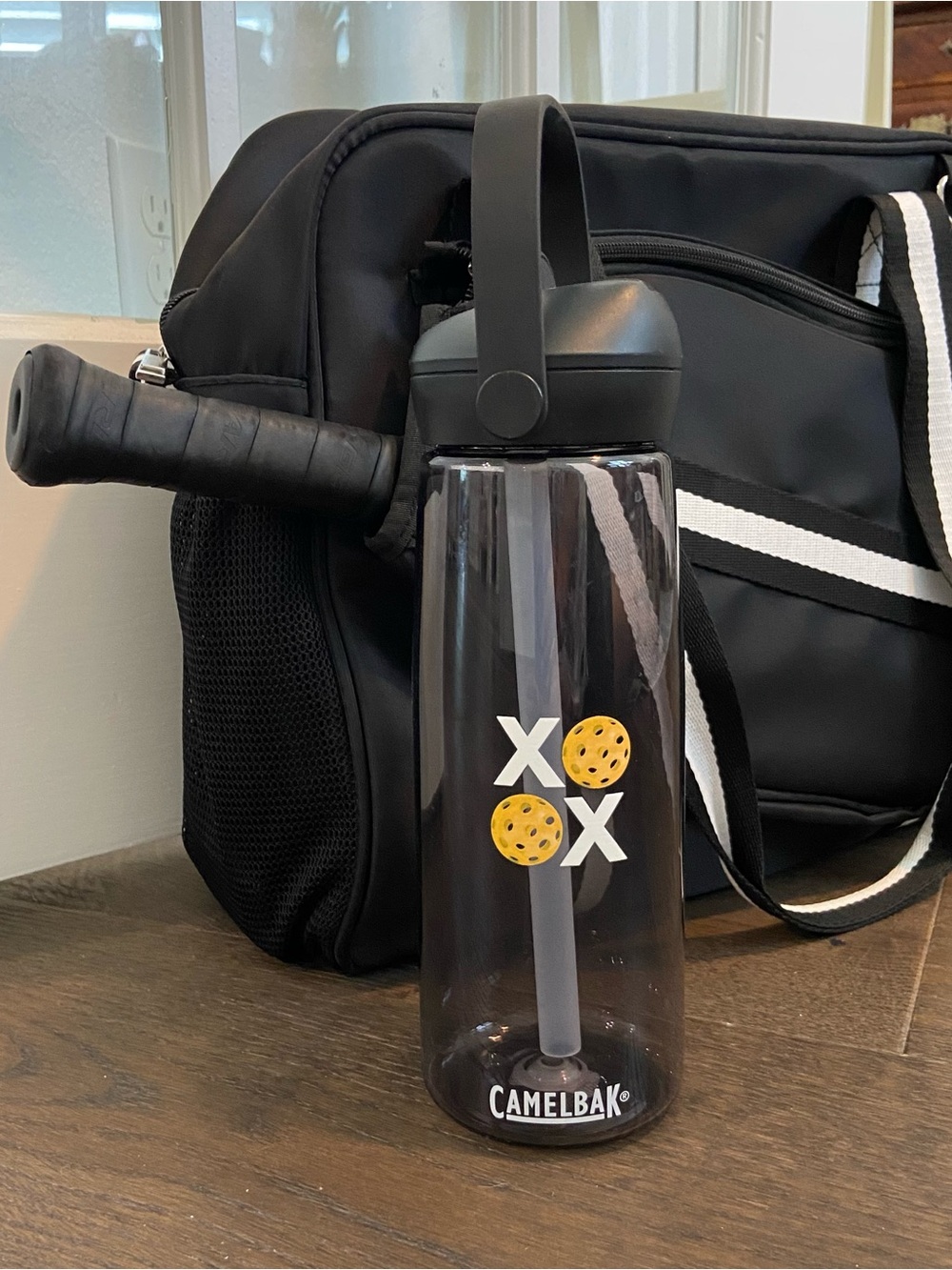 Pickleball Water Bottle with Black Lid and Yellow Pickleball Graphic Camelbak